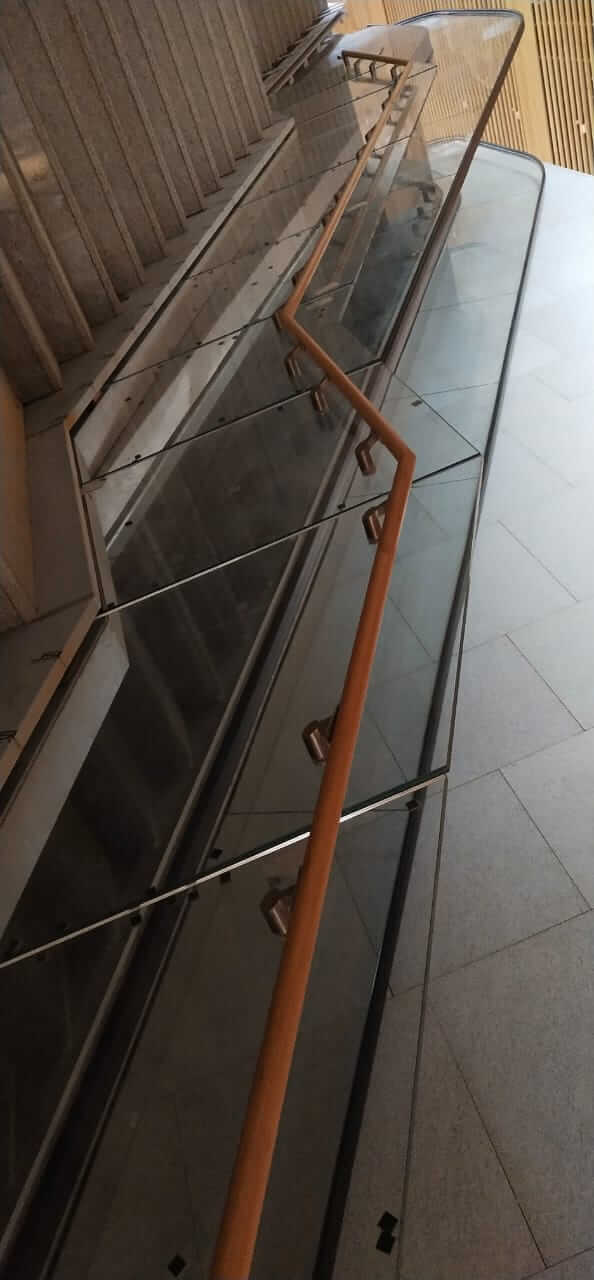 Bamboo hand railing at bengaluru international airport T2